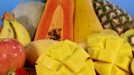 vibrant display of various sliced and whole fruits