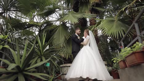 Newlyweds.-Caucasian-groom-with-bride-in-the-park.-Wedding-couple.-Happy-family