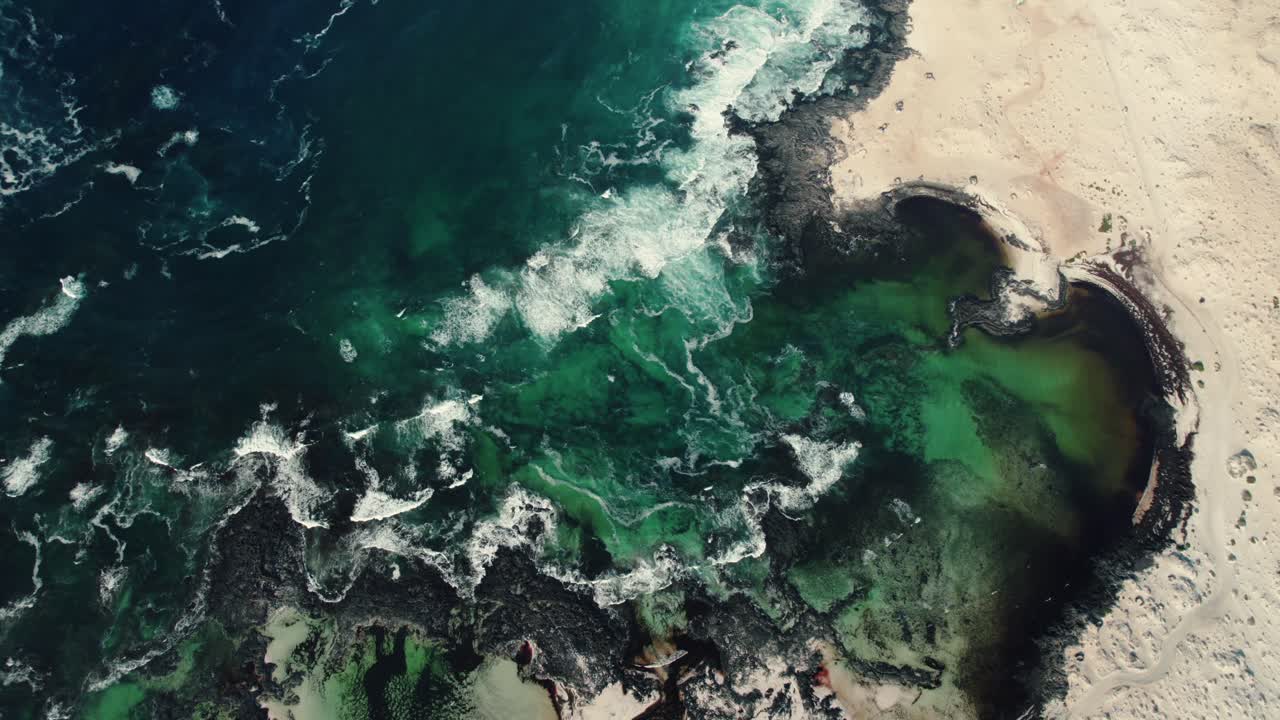 Drone aerial of erosion shapes formed by tide and tidal pools