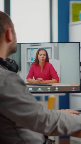 vertical video videographer in web online conference with project manager