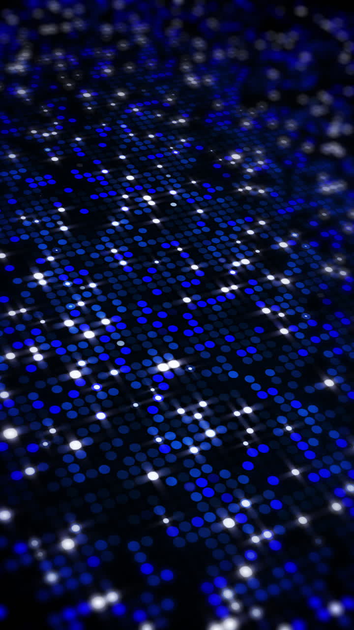 Dark blue dotted matrix with glowing white sparkles and bokeh effect in perspective. Abstract blue digital dot grid background with light flares. Loop animation. Vertical video