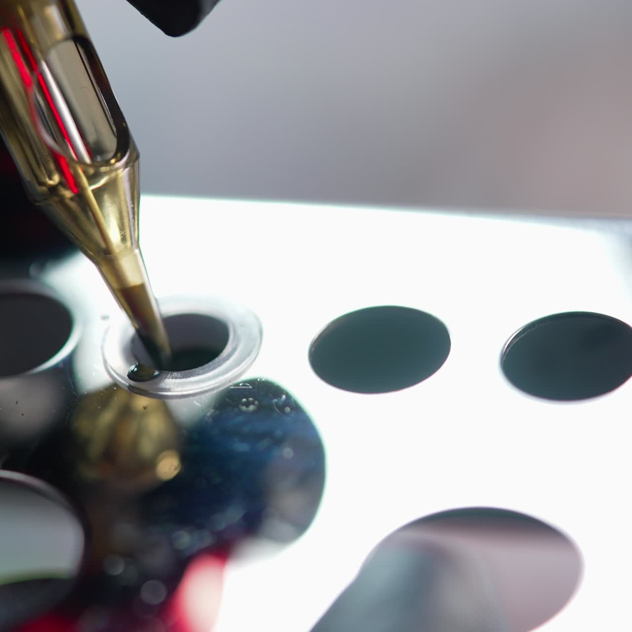 Cosmetologist preparing to applying permanent makeup on eyebrows. Permanent make up. Selective focus and shallow, closeup
