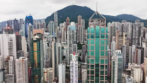 a large city filled with tall buildings under a cloudy sky