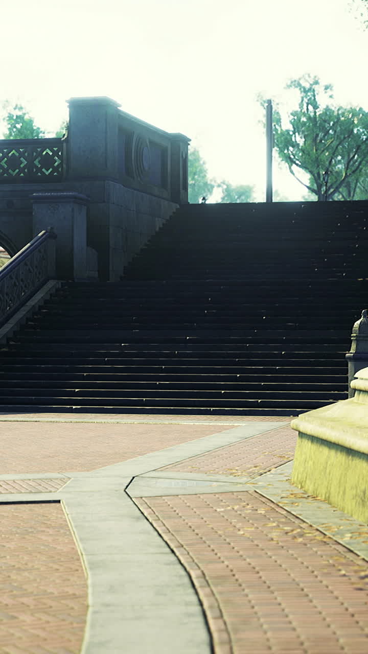 Quiet open space with stone stairs under warm morning glow and shadows