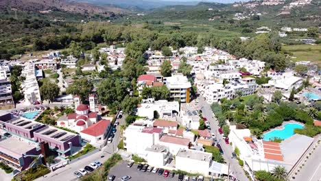 Calm-township-with-hotels-and-resorts-in-Crete,-aerial-view