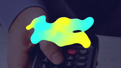 animation d'une tache colorée sur le terminal de paiement
