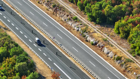 Telephoto-drone-shot-of-traffic-on-a-route-E751,-summer-evening-in-Croatia