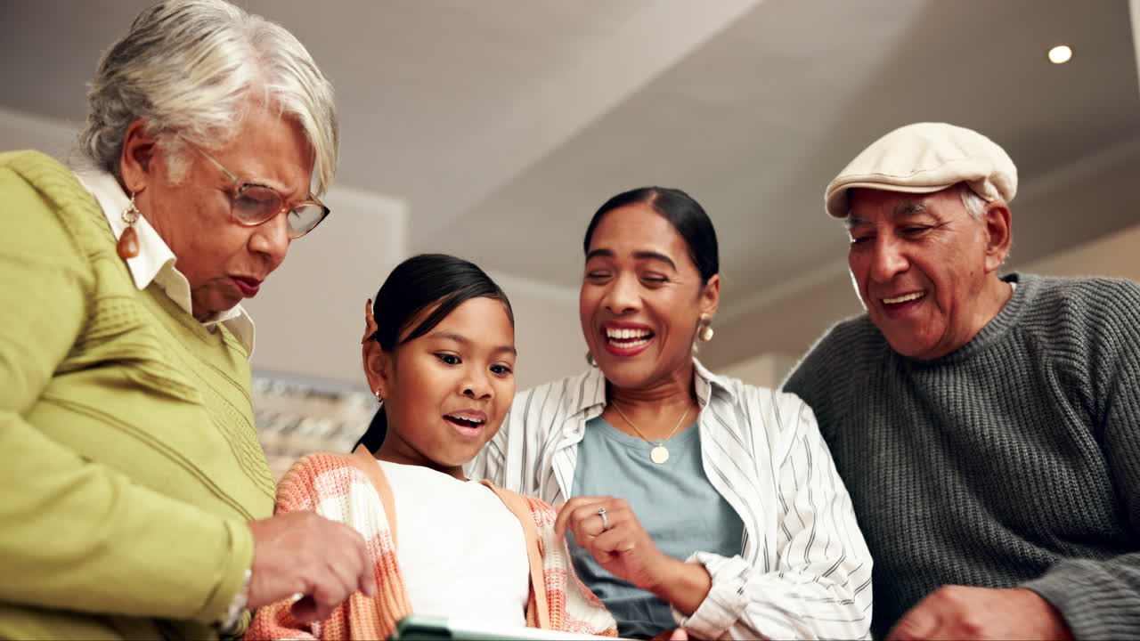 Family looking at tablet