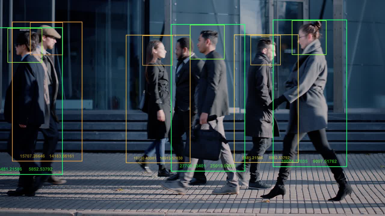 Crowd of Business People Tracked with Technology Walking on Busy Urban City Streets. CCTV AI Facial Recognition Big Data Analysis Interface Scanning, Showing Animated Information.