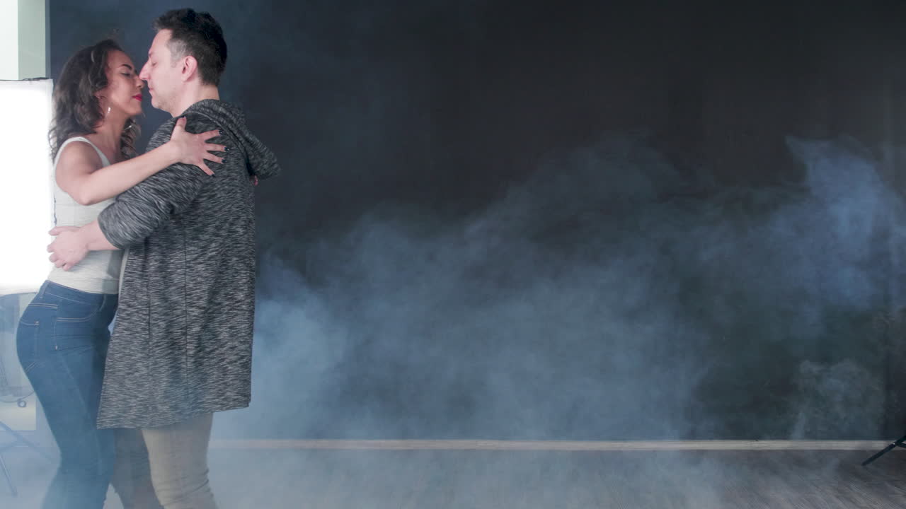 A couple dancing in a studio