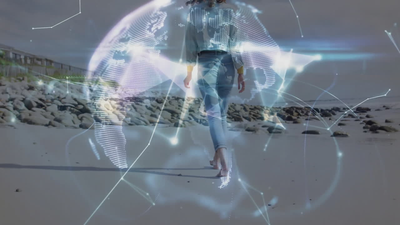 Walking on beach, person interacting with digital globe and animation overlay