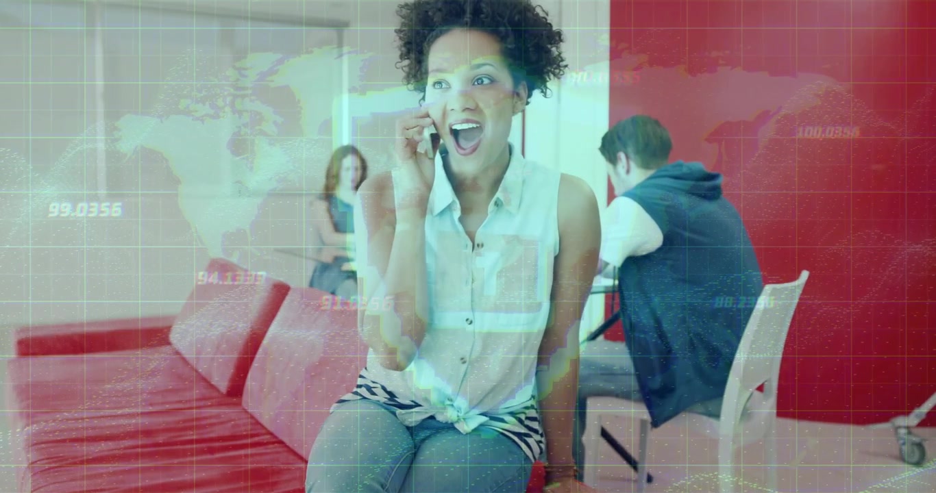 Woman answering phone on red sofa in tech lounge, laughing then surprised while HUD overlay appears