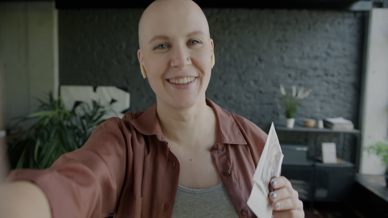 Happy Pregnant Woman Showing Ultrasound Photo