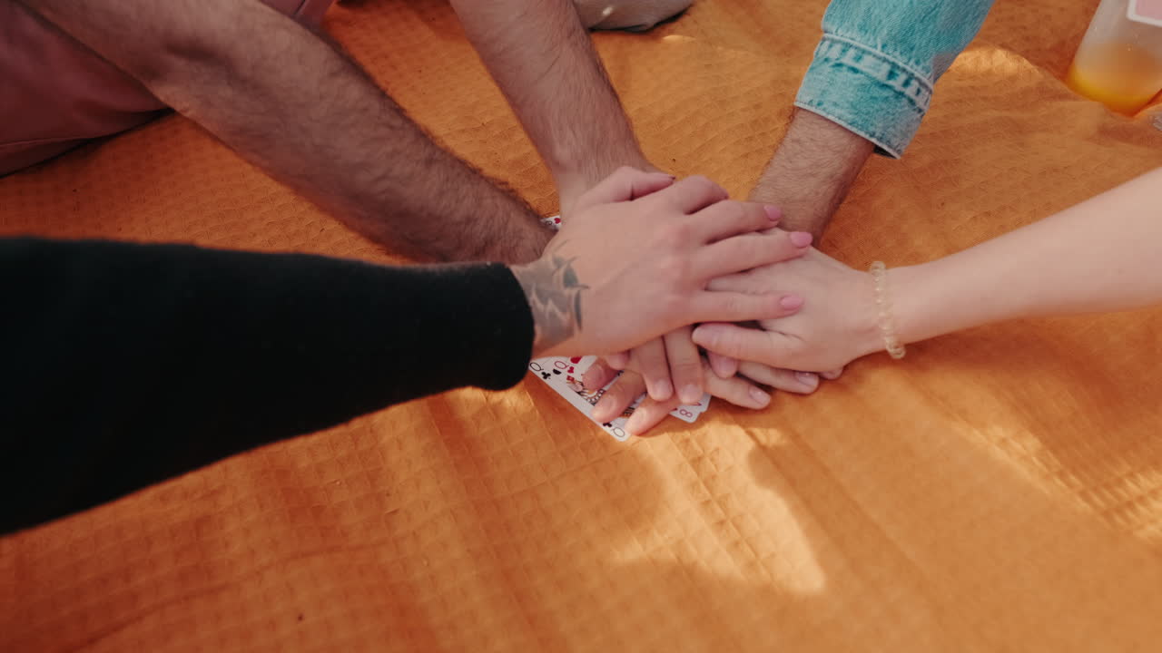 Friends Playing Cards and Enjoying Picnic
