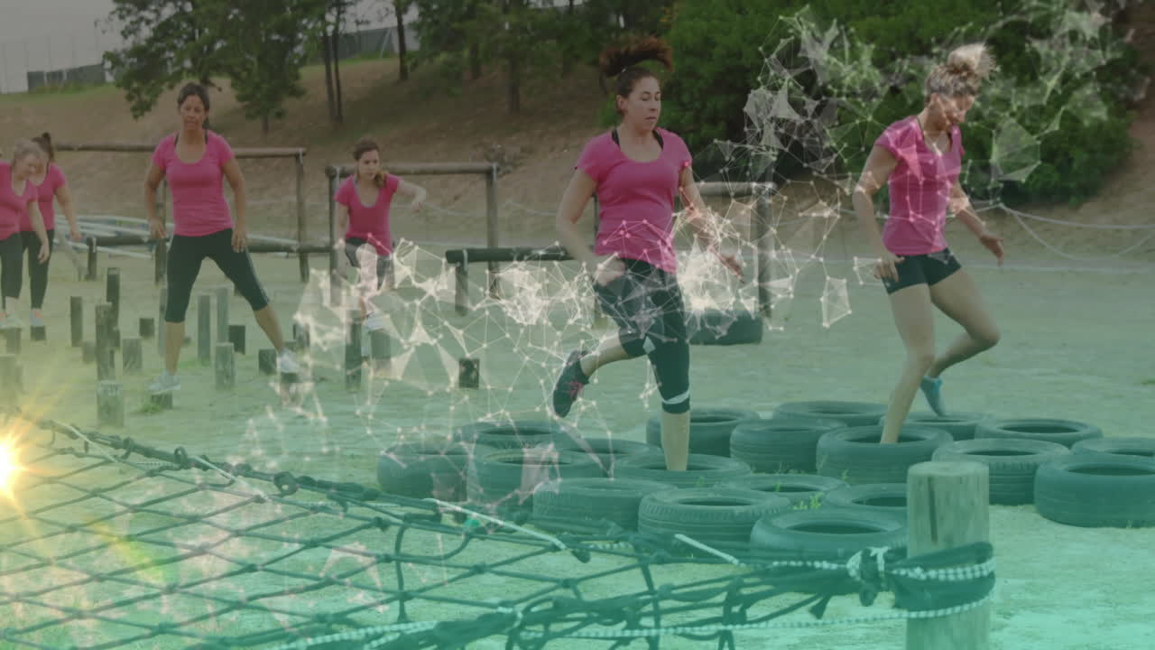 Navigating obstacle course, women interacting with digital network animation overlay