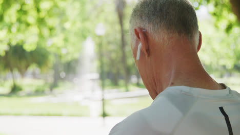 Rear-view-of-senior-man-running-in-the-park