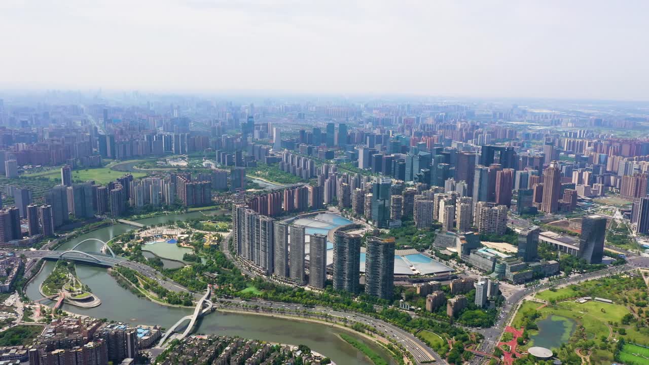 Wide drone shot of the Tianfu New Area cityscape during the day in Chengdu, Sichuan, China
