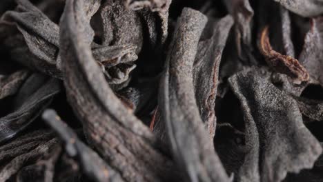 black large-leaf tea super macro close up.