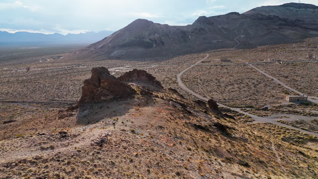 Drone shot of hills in Rhyolite ghost town in Death Valley