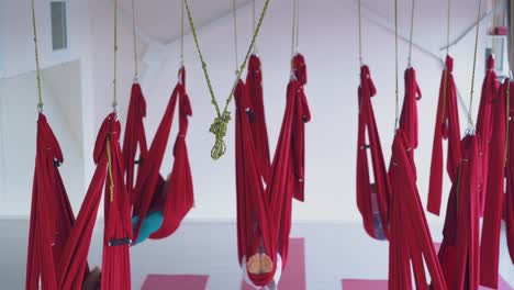 hanging anti-gravity yoga hammocks with sleeping tired women