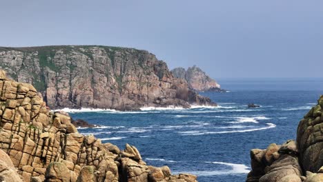 rugged coastal cliffs and ocean waves