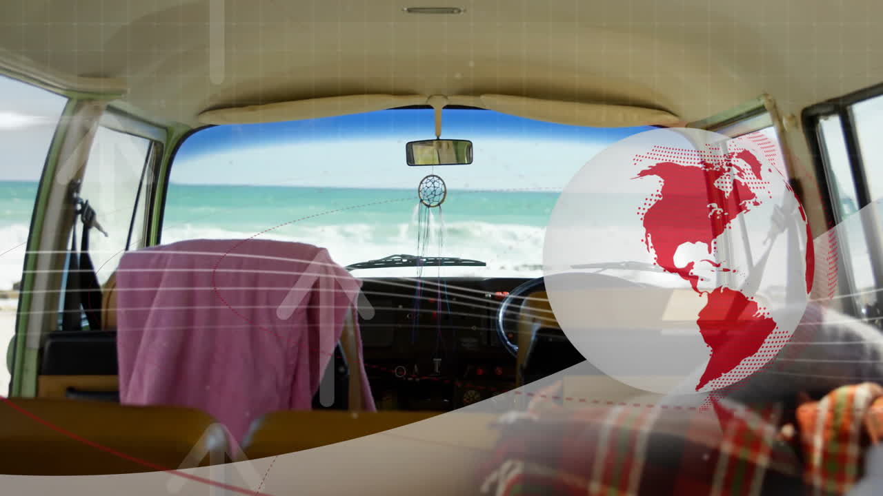 Facing ocean, van interior with animated world map overlay on window