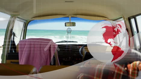facing ocean, van interior with animated world map overlay on window