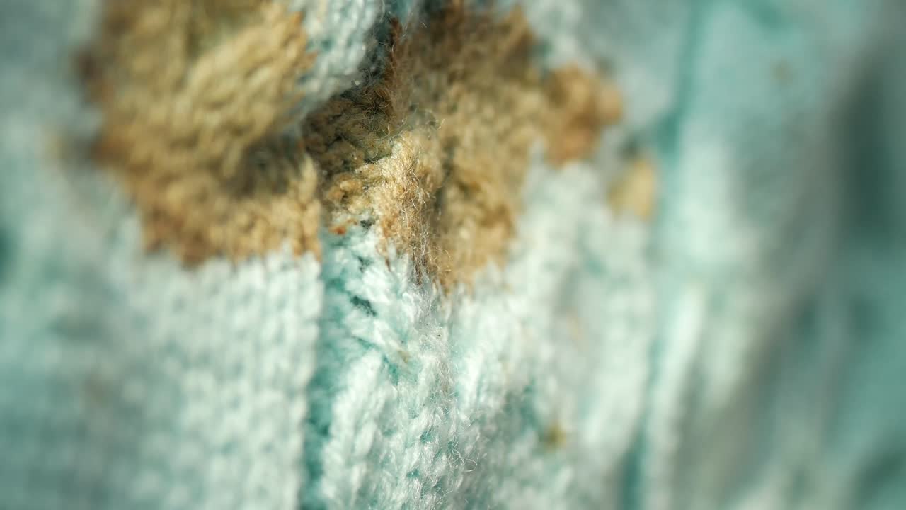 Close-up of a stained knitted fabric