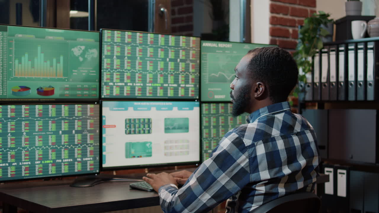Hedge fund trader analyzing exchange market charts and graphs