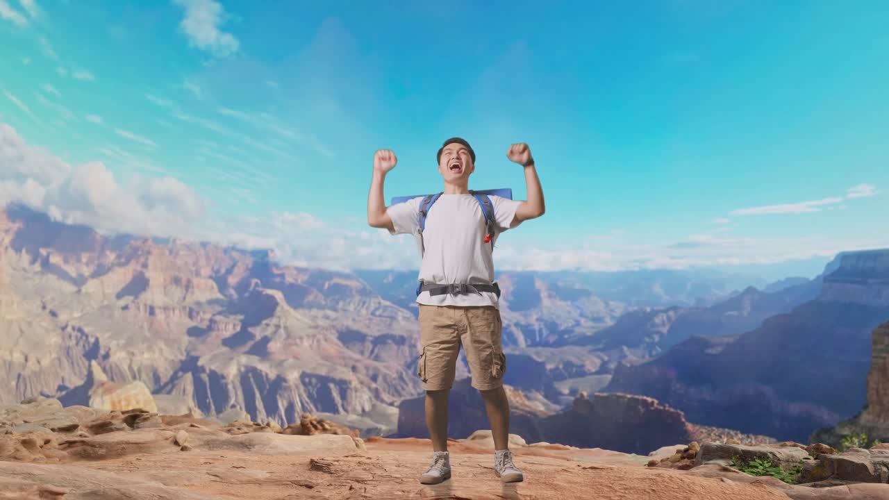 Full Body Of Asian Male Hiker With Mountaineering Backpack Screaming Goal Celebrating The Success While Traveling At The Top Of Mountain