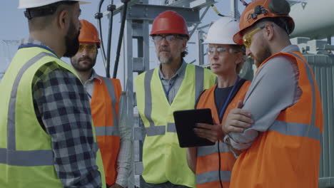power plant engineers in discussion