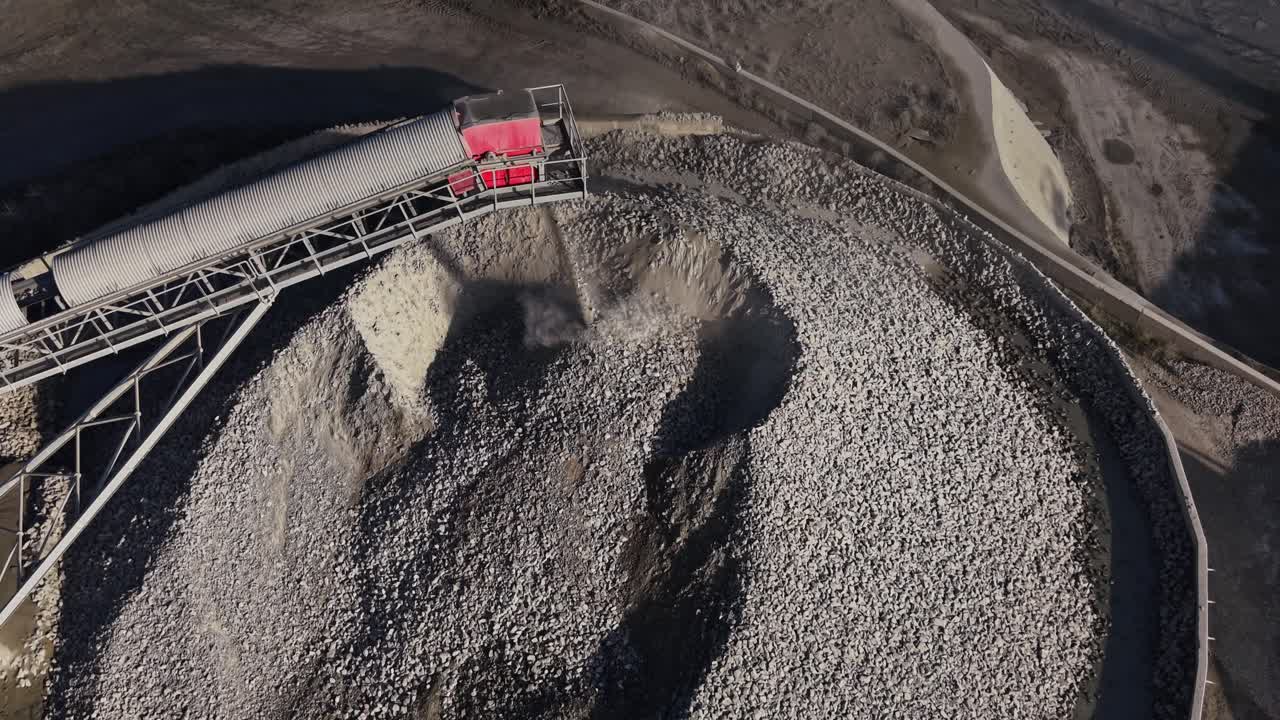 Conveyor belt transports stones at a quarry in operation