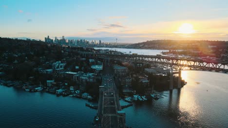 slow establishing shot of lake union and bridges overlooking downtown seattle