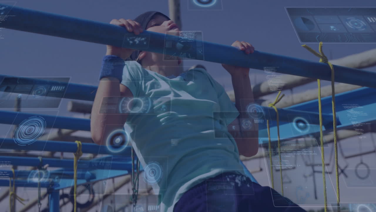 In school playground, child doing pull-ups with animation overlay on equipment