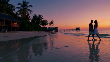 romantic sunset couple on tropical beach