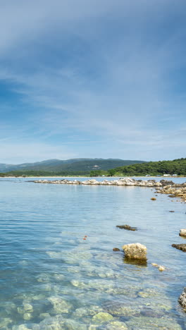 wild beach in greece in vertical