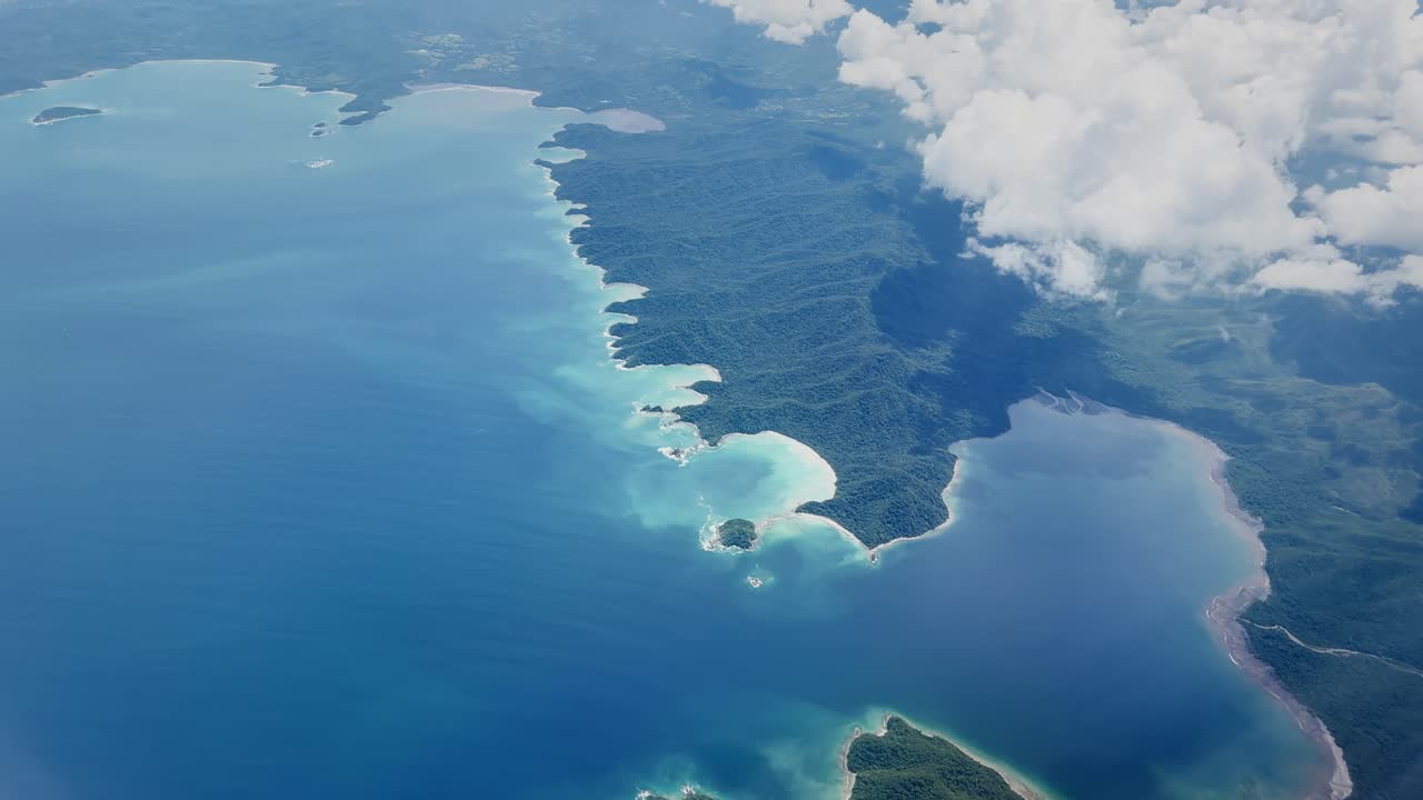 View of Costa Rica, ocean, coastline from commercial flight