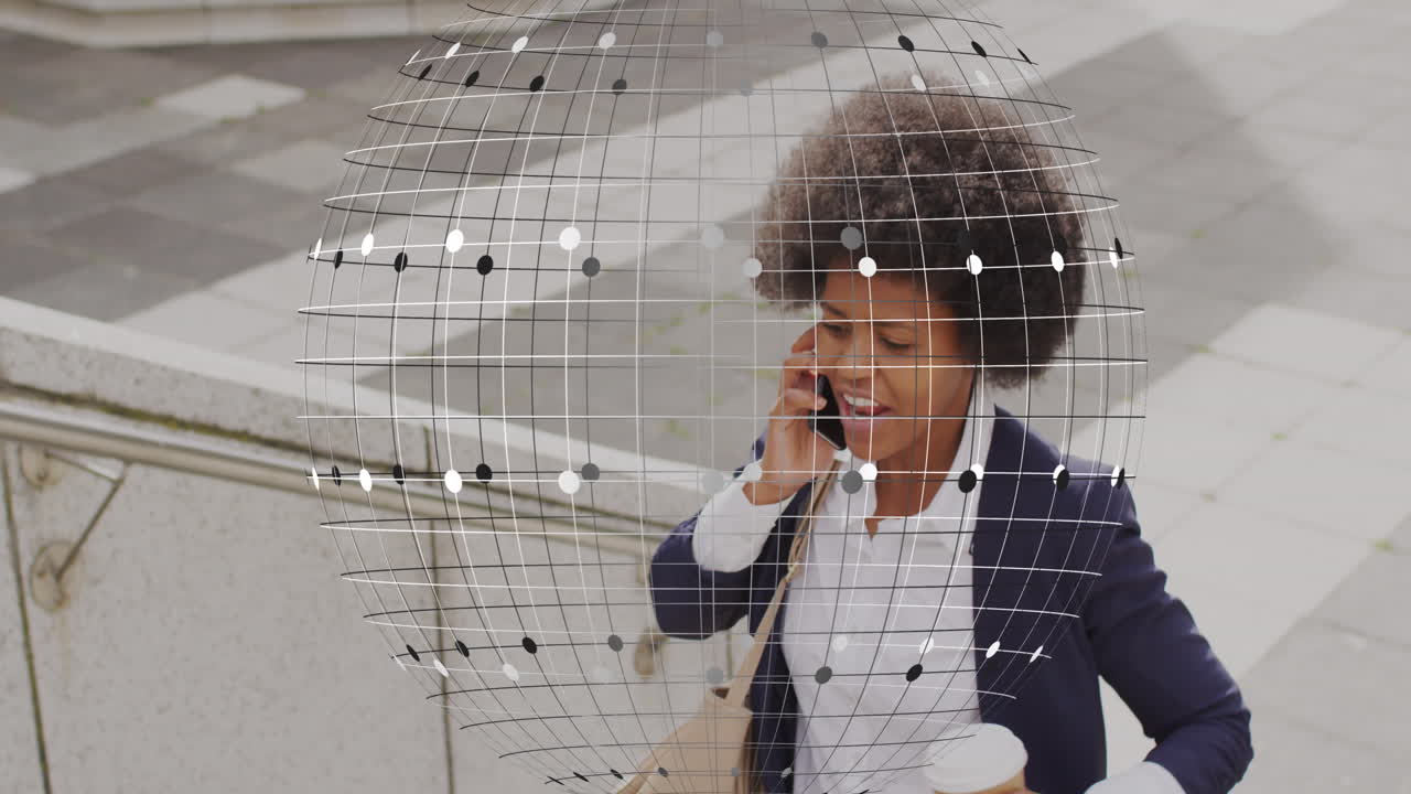 Animation of globe and business data over african american woman using smartphone