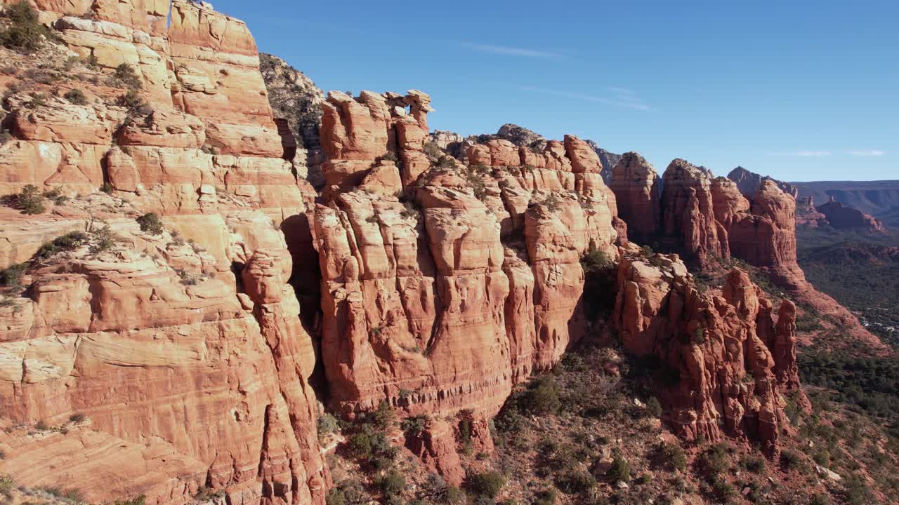 Aerial View of Sandstone Cliffs and Rock Formations on Hot Sunny Day, Sedona Arizona USA