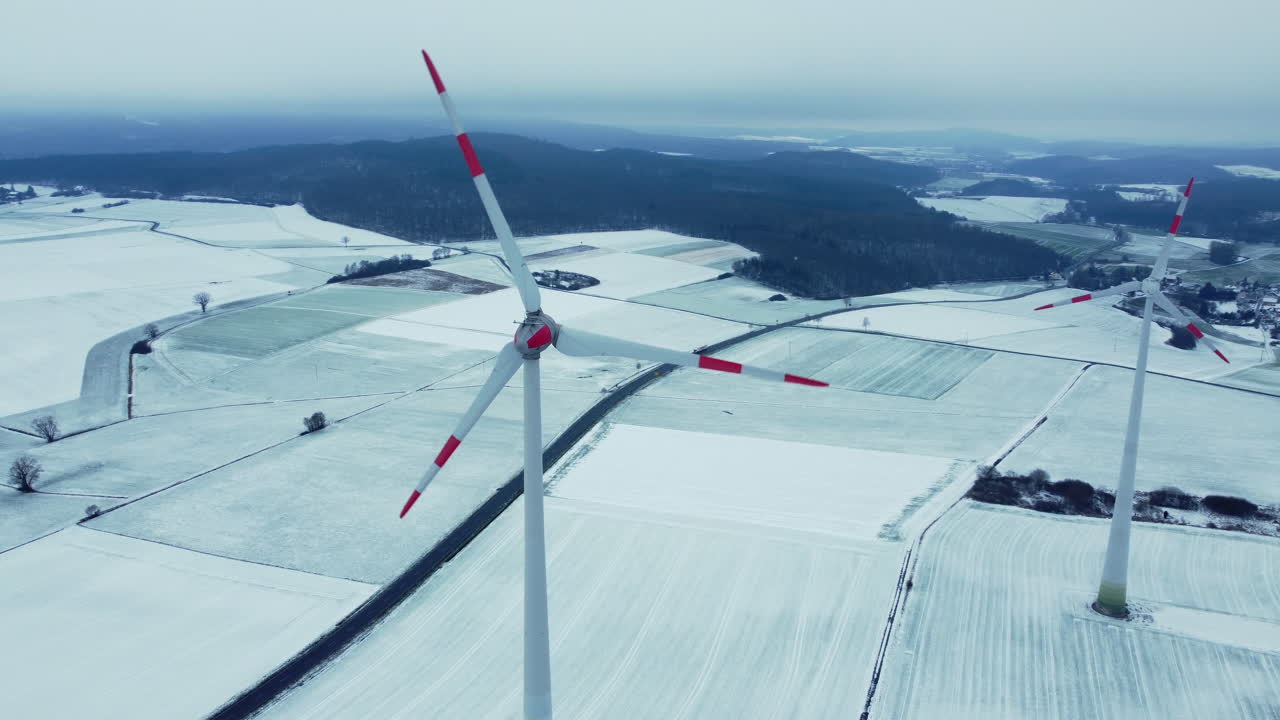 Snowy Landscape with Wind Turbines
