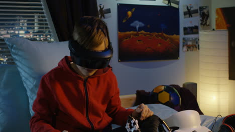 boy playing vr game in his bedroom