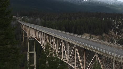 a look across a rural bridge spanning a wide canyon
