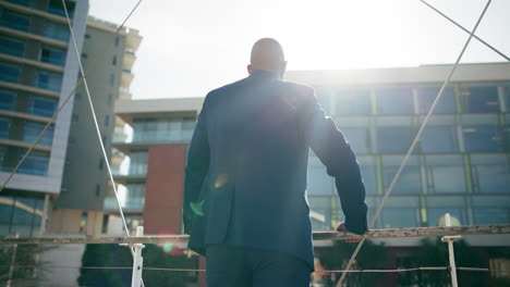 businessman contemplating the city