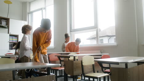 students entering classroom.