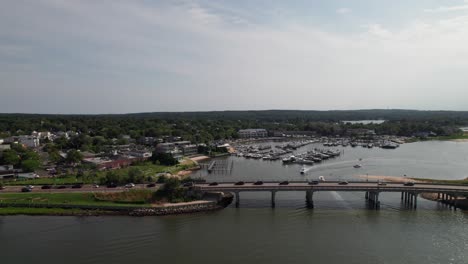 Bridge-entering-Sag-Harbor,-Long-Island,-drone-shot