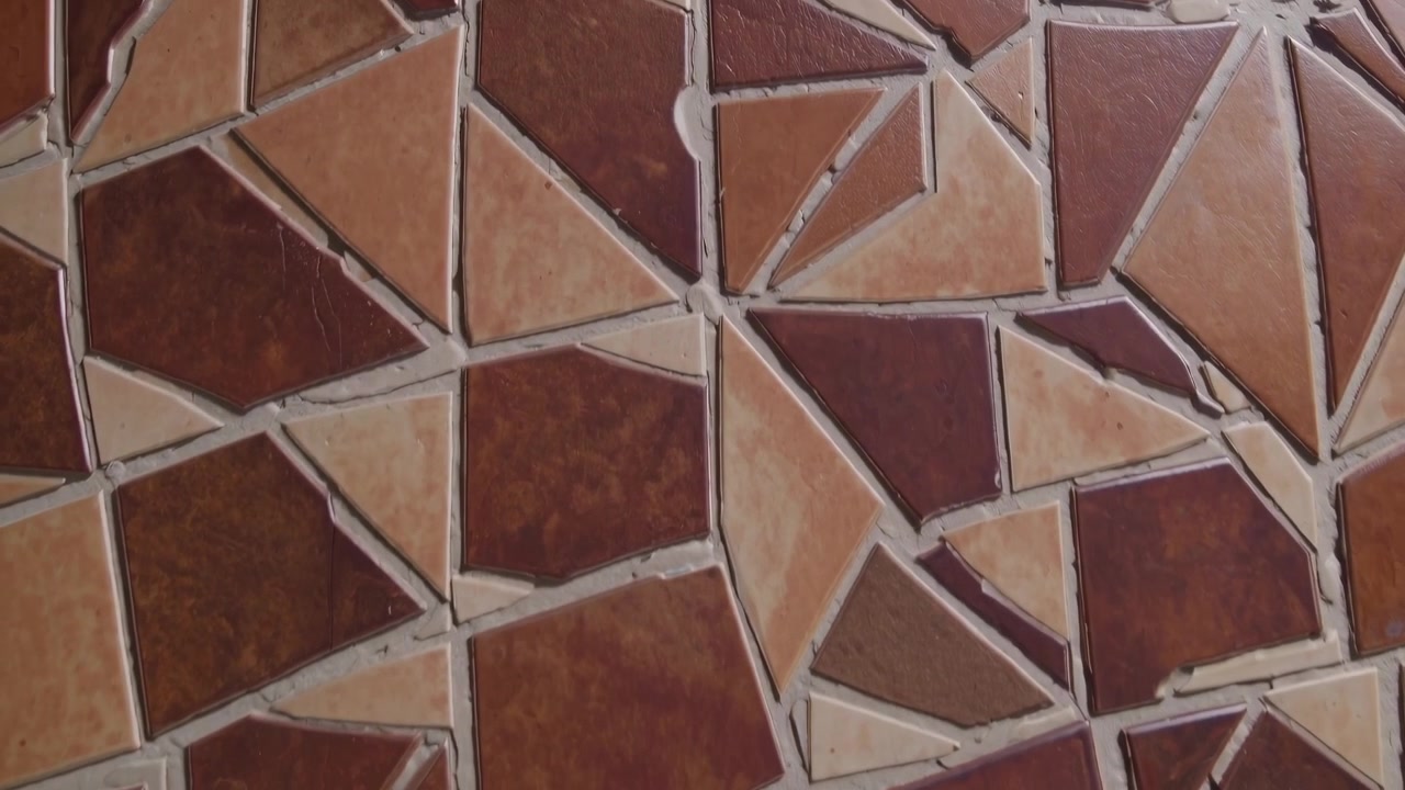 Close-up of Brown and Beige Irregular Mosaic Tile Pattern