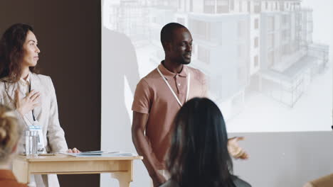 african american architect giving speech on business conference