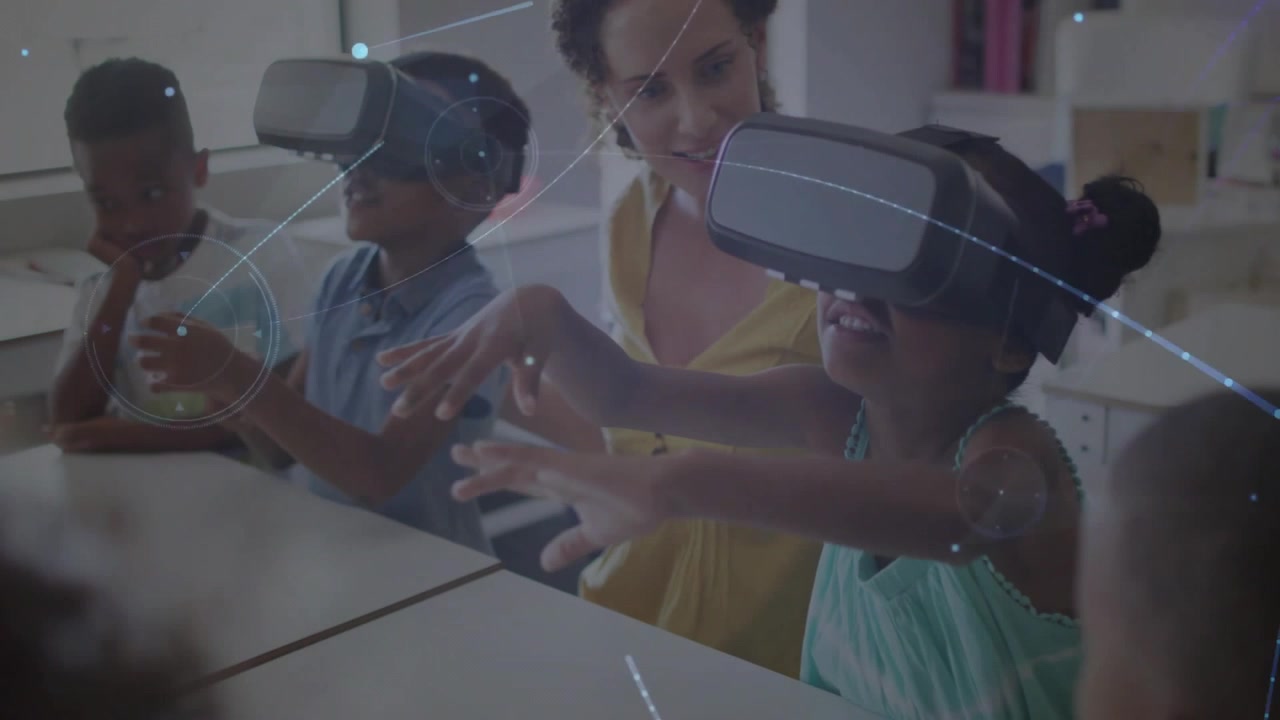 In school, children and teacher using VR headsets for animation exploration