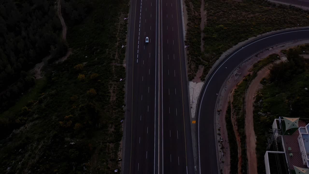 Aerial View of a Modern Highway Interchange at Dusk