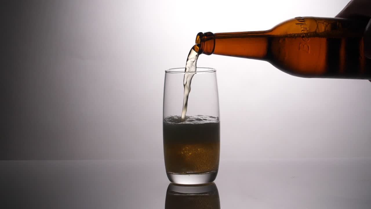 Pouring Beer Into A Glass, Slow Motion